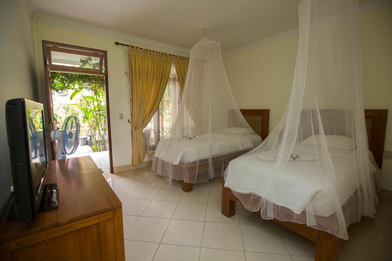 Toba Village Inn Tuk Tuk Esterno foto